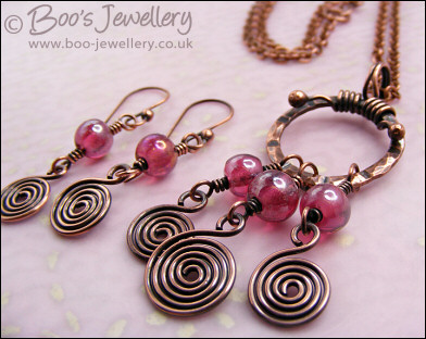 Pink glass and copper spirals necklace and earring set