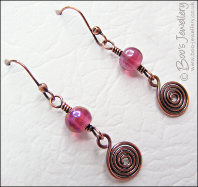 Pink glass and copper spirals necklace and earring set