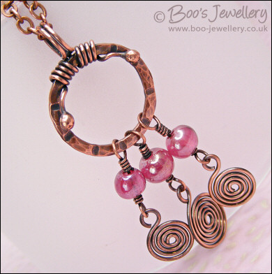 Pink glass and copper spirals necklace and earring set