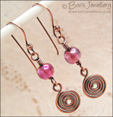 Pink glass and copper spirals necklace and earring set