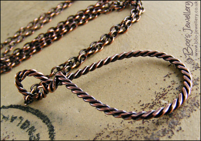 Antiqued copper knotted rope loop pendant on chain