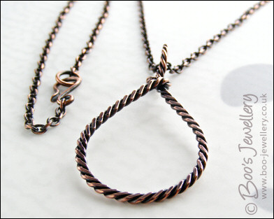 Antiqued copper knotted rope loop pendant on chain