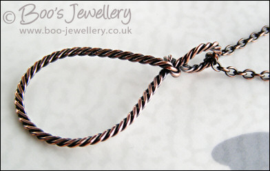 Antiqued copper knotted rope loop pendant on chain