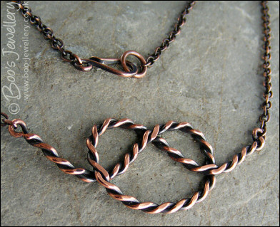 Twisted antiqued copper knot necklace