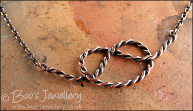 Twisted antiqued copper knot necklace