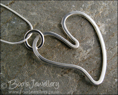Highly polished Sterling silver heart pendant