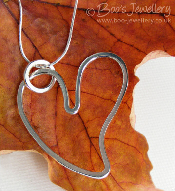 Highly polished Sterling silver heart pendant