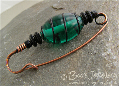 Green and black antiqued copper kilt pin